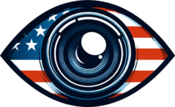 A stylized illustration of an eye, where the pupil is replaced with a camera lens, set against the backdrop of the American flag. The flag's elements are integrated into the eye's outline, with stars on the left side and stripes on the right, merging national symbolism with themes of surveillance and spying.